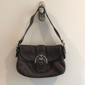 Leather coach handbag.